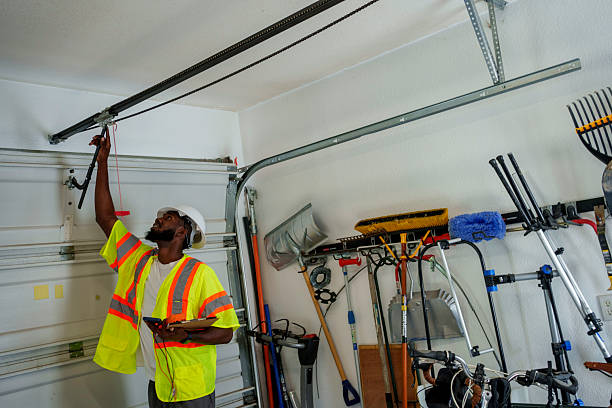 Professional Garage Door Maintenance technician working in Sherrelwood, CO